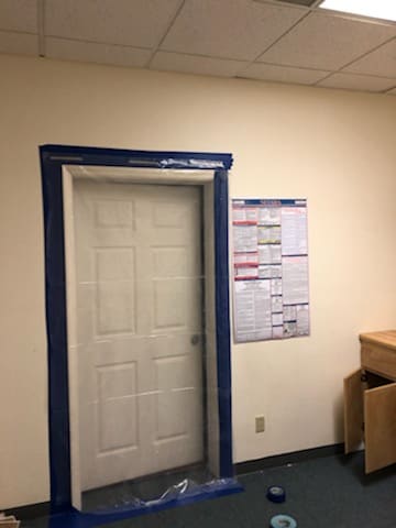 Doorways sealed and taped so the practice kept seeing patients down the hall